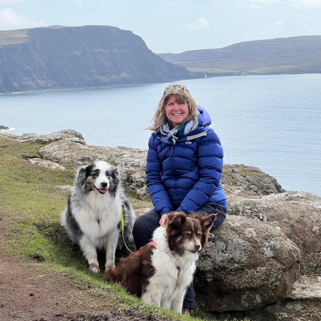 A photo of Jane and her two dogs